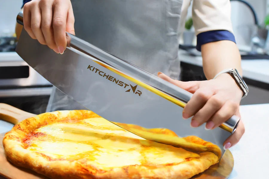 Kitchenstar rocker pizza cutter slicing a pizza