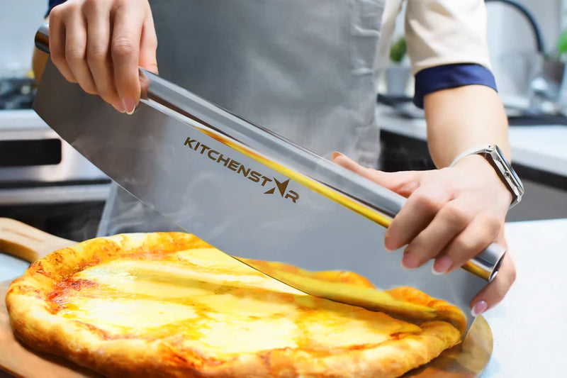 Kitchenstar rocker pizza cutter slicing a pizza